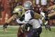 Washington running back Myles Gaskin (9), is tackled by Washington State linebacker Peyton Pelluer as he rushes during the first half of an NCAA college football game, Friday, Nov. 23, 2018, in Pullman, Wash. (AP Photo/Ted S. Warren)