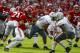 Alabama quarterback Tua Tagovailoa (13) carries the ball as he tries to get around Citadel linebacker Willie Eubanks III (9) during the second half of an NCAA college football game, Saturday, Nov. 17, 2018, in Tuscaloosa, Ala. (AP Photo/Butch Dill)