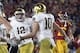 Notre Dame wide receiver Chris Finke, foreground, celebrates his touchdown with quarterback Ian Book (12) during the first half of an NCAA college football game against Southern California on Saturday, Nov. 24, 2018, in Los Angeles. (AP Photo/Mark J. Terrill)