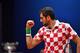 Croatian player Marin Cilic reacts during the single tennis match against French Lucas Pouille as part of the Davis Cup final between France and Croatia, on November 25, 2018 in Lille, northern France. (Photo by Philippe HUGUEN / AFP) (Photo credit should read PHILIPPE HUGUEN/AFP/Getty Images)