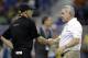 Oregon coach Mark Helfrich, left, shakes hands with Texas coach Mack Brown, right, before the Valero Alamo Bowl NCAA college football game, Monday, Dec. 30, 2013, in San Antonio. (AP Photo/Eric Gay)