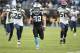 Carolina Panthers' Christian McCaffrey (22) runs for a long gain against the Seattle Seahawks during the second half of an NFL football game in Charlotte, N.C., Sunday, Nov. 25, 2018. (AP Photo/Mike McCarn)