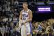 Philadelphia 76ers guard T.J. McConnell (12) holds his shoe after losing it during gameplay in the first half of an NBA basketball game against the Memphis Grizzlies Saturday, Nov. 10, 2018, in Memphis, Tenn. (AP Photo/Brandon Dill)