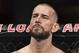 FILE - In this Sept. 10, 2016, file photo, CM Punk stands in his corner before a welterweight bout at UFC 203 in Cleveland. Punk went 0-2 in UFC and has given himself until the new year to decide if he wants to keep fighting. Punk hopes to stick in the sport as a mixed martial arts announcer. (AP Photo/David Dermer, File)