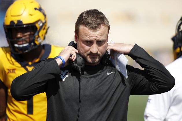 MORGANTOWN, WV - OCTOBER 06: Offensive coordinator Jake Spavital of the West Virginia Mountaineers looks on during the game against the Kansas Jayhawks at Mountaineer Field on October 6, 2018 in Morgantown, West Virginia. The Mountaineers won 38-22. (Photo by Joe Robbins/Getty Images)