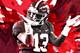 TUSCALOOSA, AL - NOVEMBER 24: Tua Tagovailoa #13 of the Alabama Crimson Tide reacts after passing for a touchdown to Henry Ruggs III #11 against the Auburn Tigers at Bryant-Denny Stadium on November 24, 2018 in Tuscaloosa, Alabama. (Photo by Kevin C. Cox/Getty Images)