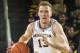 Michigan forward Ignas Brazdeikis (13) dribbles the ball in the first half of an NCAA college basketball game against Chattanooga at Crisler Center in Ann Arbor, Mich., Friday, Nov. 23, 2018. Michigan won 83-55. (AP Photo/Tony Ding)