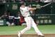 MLB All-Star catcher J.T. Realmuto of the Miami Marlins hits a three-run home-run off All Japan's pitcher Masaru Sato in the eighth inning of Game 2 of their All-Stars Series baseball at Tokyo Dome in Tokyo, Saturday, Nov. 10, 2018. (AP Photo/Toru Takahashi)