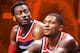 Washington Wizards guard John Wall (2) and guard Bradley Beal (3) stand on the court during the first half of an NBA preseason basketball game against the New York Knicks, Monday, Oct. 1, 2018, in Washington. (AP Photo/Nick Wass)