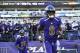 Baltimore Ravens quarterback Lamar Jackson (8) runs onto the field to warm up before an NFL football game against the Oakland Raiders, Sunday, Nov. 25, 2018, in Baltimore. (AP Photo/Nick Wass)