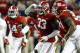 FILE - In this Saturday, Nov. 24, 2018, file photo, Alabama linebacker Anfernee Jennings (33) celebrates with teammates after an interception against Auburn during the second half of an NCAA college football game in Tuscaloosa, Ala. No. 1 Alabama's typically tough defense will be challenged by No. 4 Georgia's offense that enters Saturday's SEC championship game on a roll. (AP Photo/Butch Dill, FIle)