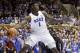 Duke's Zion Williamson (1) saves the ball from going out of bounds while Stetson's Abayomi Iyiola looks on during the first half of an NCAA college basketball game in Durham, N.C., Saturday, Dec. 1, 2018. (AP Photo/Gerry Broome)