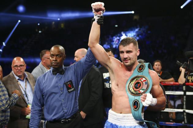 Oleksandr Gvozdyk celebrates his defeat over Tommy Karpency in their light heavyweight title bout in Las Vegas on Saturday, July 23, 2016. (AP Photo/Chase Stevens)