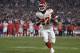 FILE - In this Nov. 19, 2018, file photo, Kansas City Chiefs running back Kareem Hunt carries during the second half of the team's NFL football game against the Los Angeles Rams in Los Angeles. A person with knowledge of the move tells The Associated Press that Hunt appears headed to the NFL's Commissioner Exempt List, sidelining him while the league investigates a video of Hunt striking a woman in February. The person spoke on condition of anonymity because the team had not issued a formal statement Friday, although one was expected for later in the evening. (AP Photo/Kelvin Kuo, File)