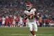 FILE - In this Nov. 19, 2018, file photo, Kansas City Chiefs running back Kareem Hunt carries during the second half of the team's NFL football game against the Los Angeles Rams in Los Angeles. A person with knowledge of the move tells The Associated Press that Hunt appears headed to the NFL's Commissioner Exempt List, sidelining him while the league investigates a video of Hunt striking a woman in February. The person spoke on condition of anonymity because the team had not issued a formal statement Friday, although one was expected for later in the evening. (AP Photo/Kelvin Kuo, File)
