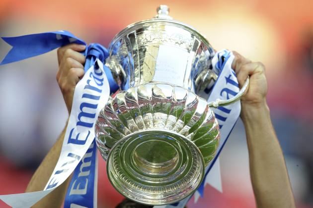 Chelsea's Cesar Azpilicueta celebrates with the trophy after winning the English FA Cup final soccer match between Chelsea and Manchester United at Wembley stadium in London, Saturday, May 19, 2018. Chelsea defeated Manchester United 1-0. (AP Photo/Rui Vieira)