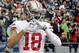 San Francisco 49ers wide receiver Dante Pettis (18) makes a heart shape with his hands after he scored a touchdown against the Seattle Seahawks during the second half of an NFL football game, Sunday, Dec. 2, 2018, in Seattle. (AP Photo/John Froschauer)