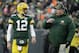 Green Bay Packers head coach Mike McCarthy talks to Aaron Rodgers during the first half of an NFL football game against the Miami Dolphins Sunday, Nov. 11, 2018, in Green Bay, Wis. (AP Photo/Mike Roemer)