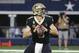 New Orleans Saints quarterback Drew Brees (9) looks to throw against the Dallas Cowboys in the first half of an NFL football game, in Arlington, Texas, Thursday, Nov. 29, 2018. (AP Photo/Ron Jenkins)