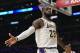 LOS ANGELES, CA - DECEMBER 02: LeBron James #23 of the Los Angeles Lakers celebrates after a slam dunk against the Phoenix Suns during the second half at Staples Center on December 2, 2018 in Los Angeles, California. NOTE TO USER: User expressly acknowledges and agrees that, by downloading and or using this photograph, User is consenting to the terms and conditions of the Getty Images License Agreement. (Photo by Kevork Djansezian/Getty Images)
