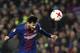 Barcelona's Argentinian forward Lionel Messi heads the ball during the Spanish 'Copa del Rey' (King's cup) quarter-final second leg football match between FC Barcelona and RCD Espanyol at the Camp Nou stadium in Barcelona on January 25, 2018. / AFP PHOTO / LLUIS GENE (Photo credit should read LLUIS GENE/AFP/Getty Images)
