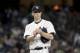 New York Yankees starting pitcher J.A. Happ prepares to throw to the Boston Red Sox during the first inning of a baseball game, Tuesday, Sept. 18, 2018, in New York. (AP Photo/Julio Cortez)