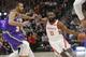 Houston Rockets guard James Harden (13) drives around Utah Jazz center Rudy Gobert, left, during the first half of an NBA basketball game Thursday Dec. 6, 2018, in Salt Lake City. (AP Photo/Rick Bowmer)