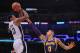 LOS ANGELES, CA - DECEMBER 05: DeMar DeRozan #10 of the San Antonio Spurs scores on a jumper over Kyle Kuzma #0 of the Los Angeles Lakers during a 121-113 Laker win at Staples Center on December 5, 2018 in Los Angeles, California. NOTE TO USER: User expressly acknowledges and agrees that, by downloading and or using this photograph, User is consenting to the terms and conditions of the Getty Images License Agreement. (Photo by Harry How/Getty Images)
