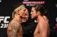 TORONTO, CANADA - DECEMBER 07: (L-R) Opponents Max Holloway and Brian Ortega face-off during the UFC 231 weigh-in at Scotiabank Arena on December 7, 2018 in Toronto, Canada. (Photo by Josh Hedges/Zuffa LLC/Zuffa LLC via Getty Images)