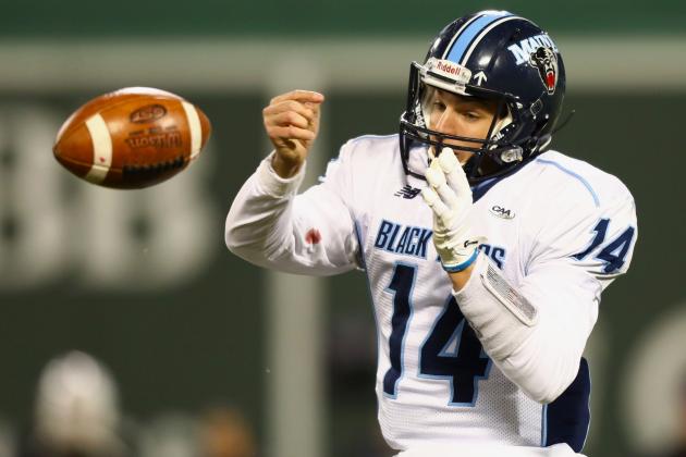 BOSTON, MA - NOVEMBER 11: Quarter back Chris Ferguson #14 of the Maine Black Bears fumbles an incomplete pass during the second half of the game against the Massachusetts Minutemen at Fenway Park on November 11, 2017 in Boston, Massachusetts. (Photo by Omar Rawlings/Getty Images)