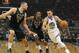 Golden State Warriors' Stephen Curry drives past Milwaukee Bucks' Eric Bledsoe and Brook Lopez during the first half of an NBA basketball game Friday, Dec. 7, 2018, in Milwaukee. (AP Photo/Morry Gash)