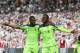 Liverpool's English striker Daniel Sturridge (L) and Liverpool's Belgian striker Divock Origi celebrate their fourth goal during the English Premier League football match between West Ham United and Liverpool at The London Stadium, in east London on May 14, 2017.n on May 14, 2017. / AFP PHOTO / Daniel LEAL-OLIVAS / RESTRICTED TO EDITORIAL USE. No use with unauthorized audio, video, data, fixture lists, club/league logos or 'live' services. Online in-match use limited to 75 images, no video emulation. No use in betting, games or single club/league/player publications. / (Photo credit should read DANIEL LEAL-OLIVAS/AFP/Getty Images)