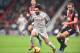 Bournemouth's English defender Steve Cook (R) challenges Liverpool's Egyptian midfielder Mohamed Salah in the build-up to Salah scoring his and Liverpool's second goal during the English Premier League football match between Bournemouth and Liverpool at the Vitality Stadium in Bournemouth, southern England on December 8, 2018. (Photo by Glyn KIRK / AFP) / RESTRICTED TO EDITORIAL USE. No use with unauthorized audio, video, data, fixture lists, club/league logos or 'live' services. Online in-match use limited to 120 images. An additional 40 images may be used in extra time. No video emulation. Social media in-match use limited to 120 images. An additional 40 images may be used in extra time. No use in betting publications, games or single club/league/player publications. / (Photo credit should read GLYN KIRK/AFP/Getty Images)