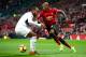 MANCHESTER, ENGLAND - DECEMBER 08: Ashley Young of Manchester United is challenged by Denis Odoi of Fulham during the Premier League match between Manchester United and Fulham FC at Old Trafford on December 8, 2018 in Manchester, United Kingdom. (Photo by Clive Brunskill/Getty Images)