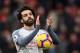 BOURNEMOUTH, ENGLAND - DECEMBER 08: Mohamed Salah of Liverpool collects the match ball after scoring a hattrick and acknowledges the fans after the Premier League match between AFC Bournemouth and Liverpool FC at Vitality Stadium on December 8, 2018 in Bournemouth, United Kingdom. (Photo by Mike Hewitt/Getty Images)