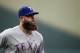 Texas Rangers' Mike Napoli walks on the field before a baseball game against the Baltimore Orioles in Baltimore, Tuesday, July 18, 2017. (AP Photo/Patrick Semansky)