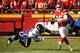 Kansas City Chiefs quarterback Patrick Mahomes (15) evades Baltimore Ravens linebacker Terrell Suggs (55) during the first half of an NFL football game in Kansas City, Mo., Sunday, Dec. 9, 2018. (AP Photo/Charlie Riedel)