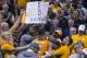 Tennessee's Admiral Schofield (5) and Grant Williams (2) goes into the crowd to celebrate with fans their win over Gonzaga in an NCAA college basketball game Sunday, Dec. 9, 2018, in Phoenix. (AP Photo/Darryl Webb)