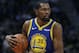 Golden State Warriors forward Kevin Durant brings the ball up court during the second half of an NBA basketball game against the Detroit Pistons, Saturday, Dec. 1, 2018, in Detroit. (AP Photo/Carlos Osorio)