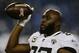 NASHVILLE, TN - DECEMBER 6: Leonard Fournette #27 of the Jacksonville Jaguars tosses a ball to a fan before the game against the Tennessee Titans at Nissan Stadium on December 6, 2018 in Nashville, Tennessee. (Photo by Silas Walker/Getty Images)