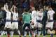 Tottenham players celebrate at the end of the Champions League group B soccer match between FC Barcelona and Tottenham Hotspur at the Camp Nou stadium in Barcelona, Spain, Tuesday, Dec. 11, 2018. (AP Photo/Emilio Morenatti)