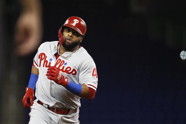 Philadelphia Phillies' Carlos Santana rounds third after hitting a solo home run during the first inning of a baseball game against the Miami Marlins, Tuesday, Sept. 4, 2018, in Miami. (AP Photo/Brynn Anderson)