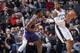 SAN ANTONIO, TX - DECEMBER 11: Deandre Ayton #22 of the Phoenix Suns plays defense against LaMarcus Aldridge #12 of the San Antonio Spurs on December 11, 2018 at the AT&T Center in San Antonio, Texas. NOTE TO USER: User expressly acknowledges and agrees that, by downloading and or using this photograph, user is consenting to the terms and conditions of the Getty Images License Agreement. Mandatory Copyright Notice: Copyright 2018 NBAE (Photos by Mark Sobhani/NBAE via Getty Images)