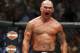 FILE - In this July 11, 2015, file photo, Robbie Lawler celebrates after defeating Rory MacDonald in their welterweight title fight mixed martial arts bout at UFC 189 in Las Vegas. Lawler believes he can avoid the upset bug that hit the majority of the UFC's champions during a tumultuous 2015. The welterweight king expects violence and victory Saturday when he takes on Carlos Condit at UFC 195 in Las Vegas. (AP Photo/John Locher, File)