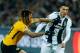 BERN, SWITZERLAND - DECEMBER 12: Kevin Mbabu of Young Boys and Cristiano Ronaldo of Juventus battle for the ball during the UEFA Champions League Group H match between BSC Young Boys and Juventus at Stade de Suisse, Wankdorf on December 12, 2018 in Bern, Switzerland. (Photo by TF-Images/TF-Images via Getty Images)