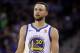 FILE - This March 6, 2018 file photo shows Golden State Warriors guard Stephen Curry during an NBA basketball game against the Brooklyn Nets in Oakland, Calif. Sony Pictures Entertainment announced Monday, April 23, that it has struck a deal with the Golden State Warriors All-Star guard to produce television, film and possibly gaming projects. (AP Photo/Jeff Chiu, File)