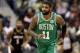 WASHINGTON, DC - DECEMBER 12: Kyrie Irving #11 of the Boston Celtics runs up the floor against the Washington Wizards in the first half at Capital One Arena on December 12, 2018 in Washington, DC. NOTE TO USER: User expressly acknowledges and agrees that, by downloading and or using this photograph, User is consenting to the terms and conditions of the Getty Images License Agreement. (Photo by Rob Carr/Getty Images)