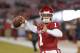FILE - In this Saturday, Nov. 17, 2018 file photo, Oklahoma quarterback Kyler Murray (1) before the start of an NCAA college football game against Kansas in Norman, Okla. Kyler Murray suddenly has a bunch of new fans in the Oakland Athletics organization, even if they cringe watching Heisman Trophy winner play quarterback for Oklahoma. The A's don't want their prized first-round draft pick hurt on the football field because they are counting on him wearing an Oakland jersey come spring training. (AP Photo/Alonzo Adams, File)