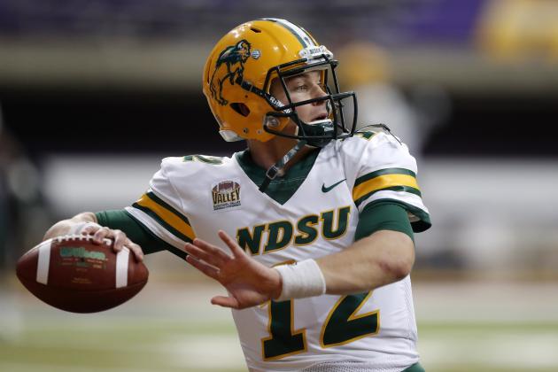 FILE - In this Saturday, Oct. 6, 2018, file photo, North Dakota State quarterback Easton Stick warms up before an NCAA college football game against Northern Iowa, in Cedar Falls, Iowa. North Dakota State quarterback Easton Stick was one of three Bison players selected to The Associated Press FCS All-America team, Tuesday, Dec. 11, 2018. (AP Photo/Charlie Neibergall, File)