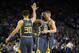 OAKLAND, CA - DECEMBER 12: Jonas Jerebko #21, Draymond Green #23, and Stephen Curry #30 of the Golden State Warriors congratulate one another after the Warriors made a basket against the Toronto Raptors at ORACLE Arena on December 12, 2018 in Oakland, California. NOTE TO USER: User expressly acknowledges and agrees that, by downloading and or using this photograph, User is consenting to the terms and conditions of the Getty Images License Agreement. (Photo by Ezra Shaw/Getty Images)